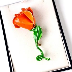 Vintage unsigned orange enamel flower brooch